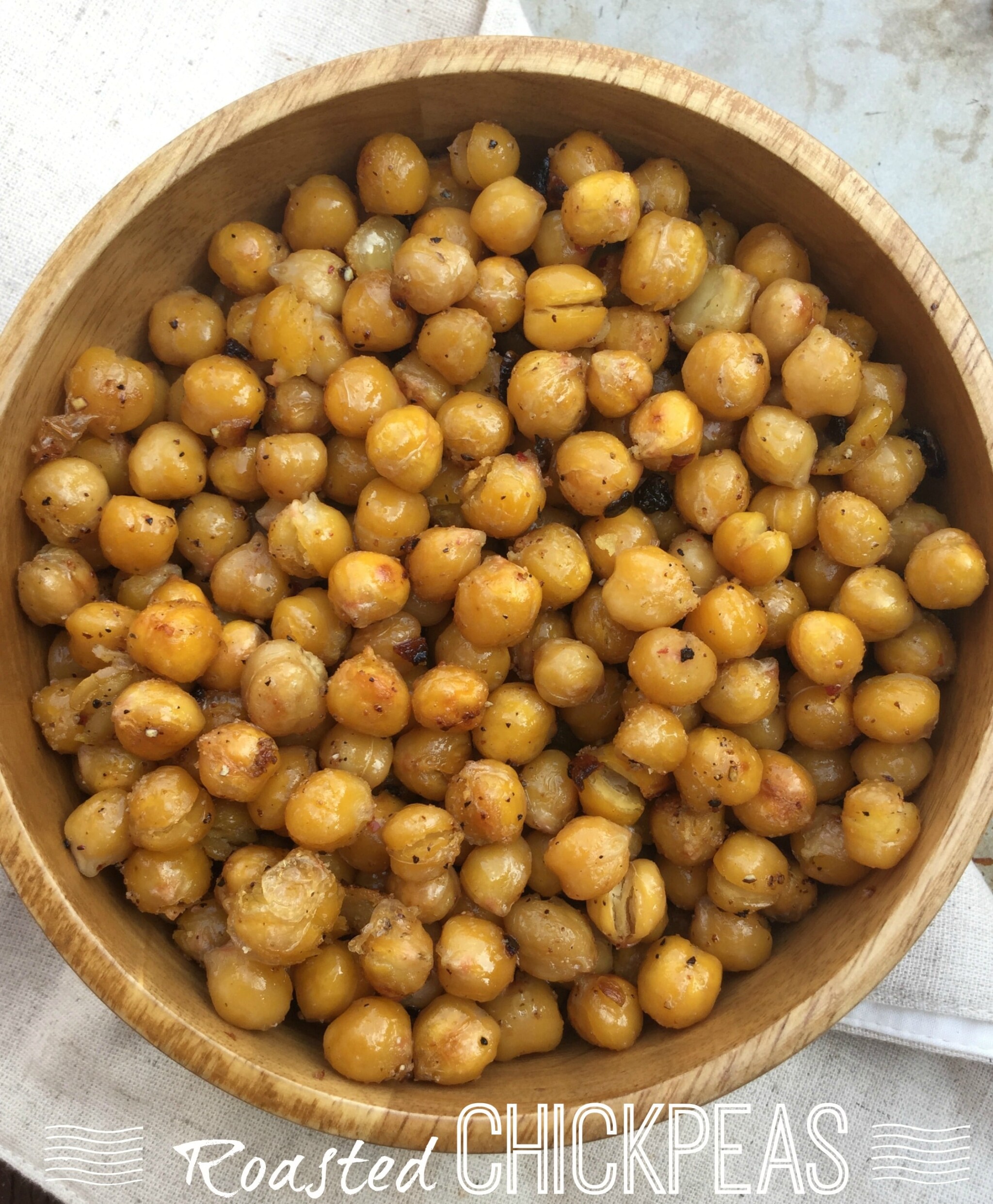 Oven roasted chickpeas deliciously flavored with garlic, chopped shallots and other spices. A great choice of healthy snack!
