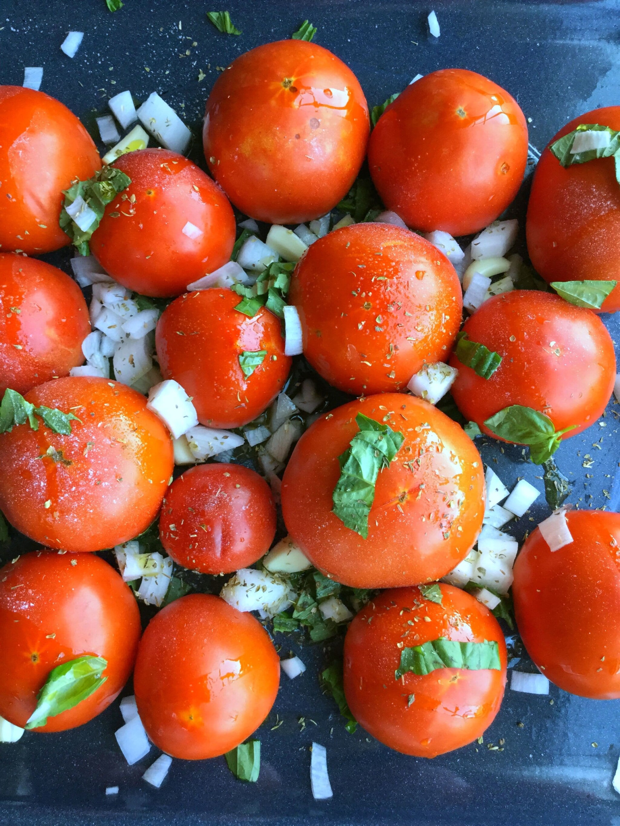 Tomatoes pre-roasting -The ultimate signature roasted tomatoes sauce, flavorful in taste and rich in consistency. 