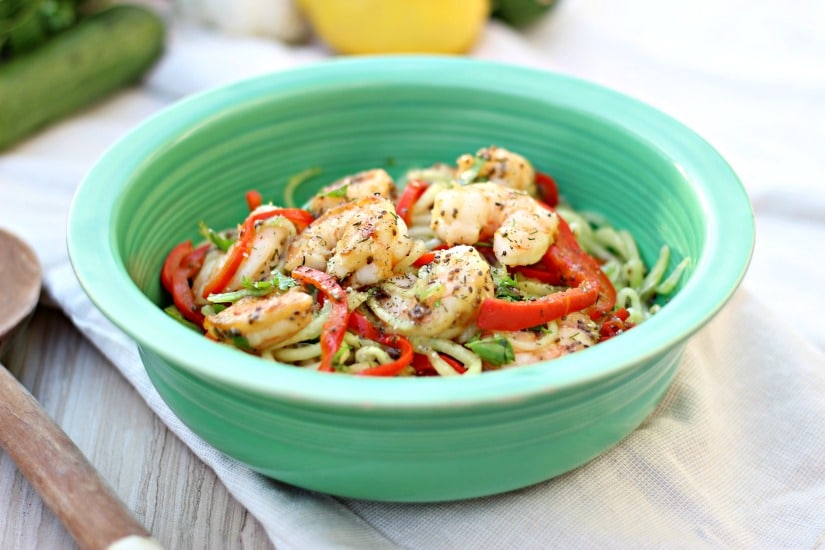 A fresh cucumber salad with shrimp sautéed in herb butter, tossed with steamed sweet red pepper and chia vinaigrette dressing with a hint of asian flavors, makes this recipe so tasty you won't want to stop eating! gardeninthekitchen.com